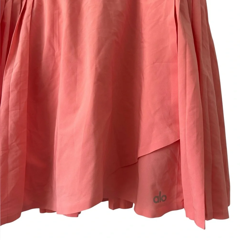 ALO Yoga Pleated Mini Skort in Coral Pink